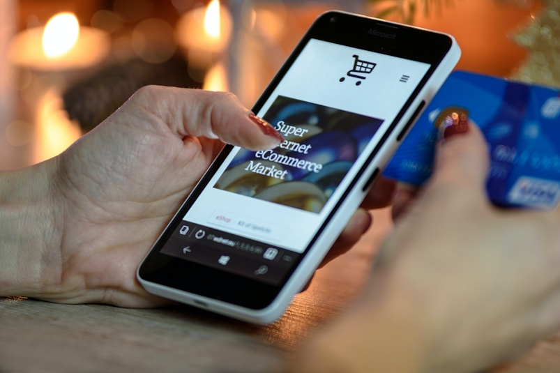 User interacting with an ecommerce site with their phone